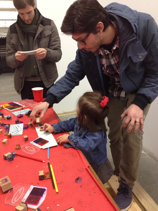 Stamping with Daddy and his coworker Erik H.