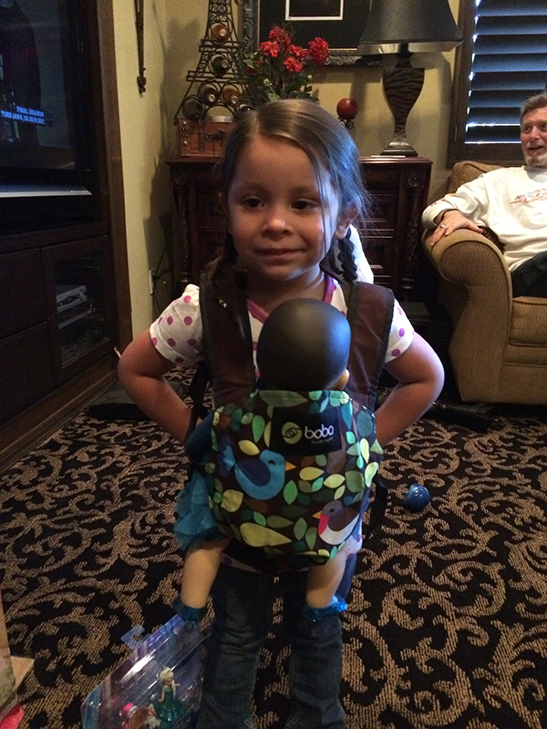 BIG sister in training! She is so excited she threw up right before this picture. 